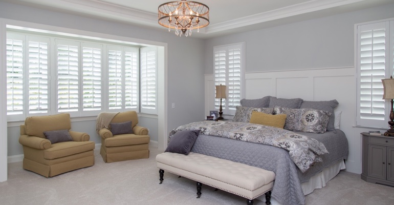 Interior shutters in Destin bedroom.